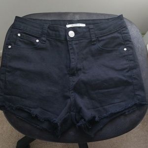 Black frayed shorts